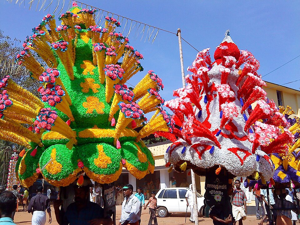 Pookkavadi at Cheerakkuzhi Temple Shashti Festival, Kerala — devotees carrying flower-decorated kavadi as an offering to Murugan