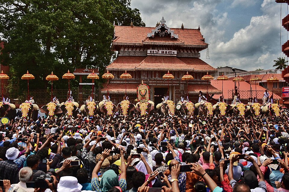 Anachamayam procession at Thrissur Pooram — caparisoned elephants and traditional music at Thekkinkadu Maidan, Thrissur