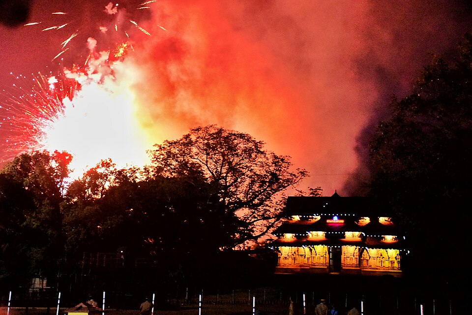 Vedikkettu fireworks display at Thrissur Pooram, Vadakkunnadhan Temple — the competitive fireworks that light up the Thrissur sky